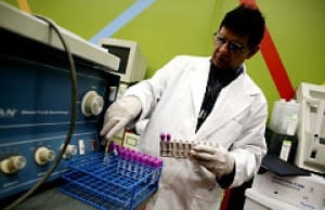Hemotology tech Athhar Prizada preps blood samples for storage at Analytical diagnostic Labs in Sheepshead Bay. (ADAMS FOR NEWS)